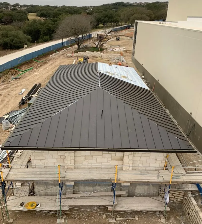 Metal roof new construction with scaffolding in Mexico